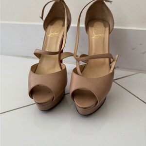 Christian Louboutin Beige Heels, Size 9.5, Used with iconic red soles.